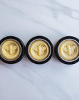 all natural bee lotion bars, made with beeswax, honey, lemon, and lavender scented, comes in tin container.
