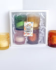 Gift set includes four fall scented tea light candles.