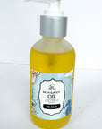 Bottle of bath and body oil with beach scent on a white background, made with all natural oils and essential oils for scent