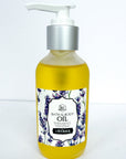 Bottle of bath and body oil with lavender design on a white background, made with all natural oils and essential oils for scent