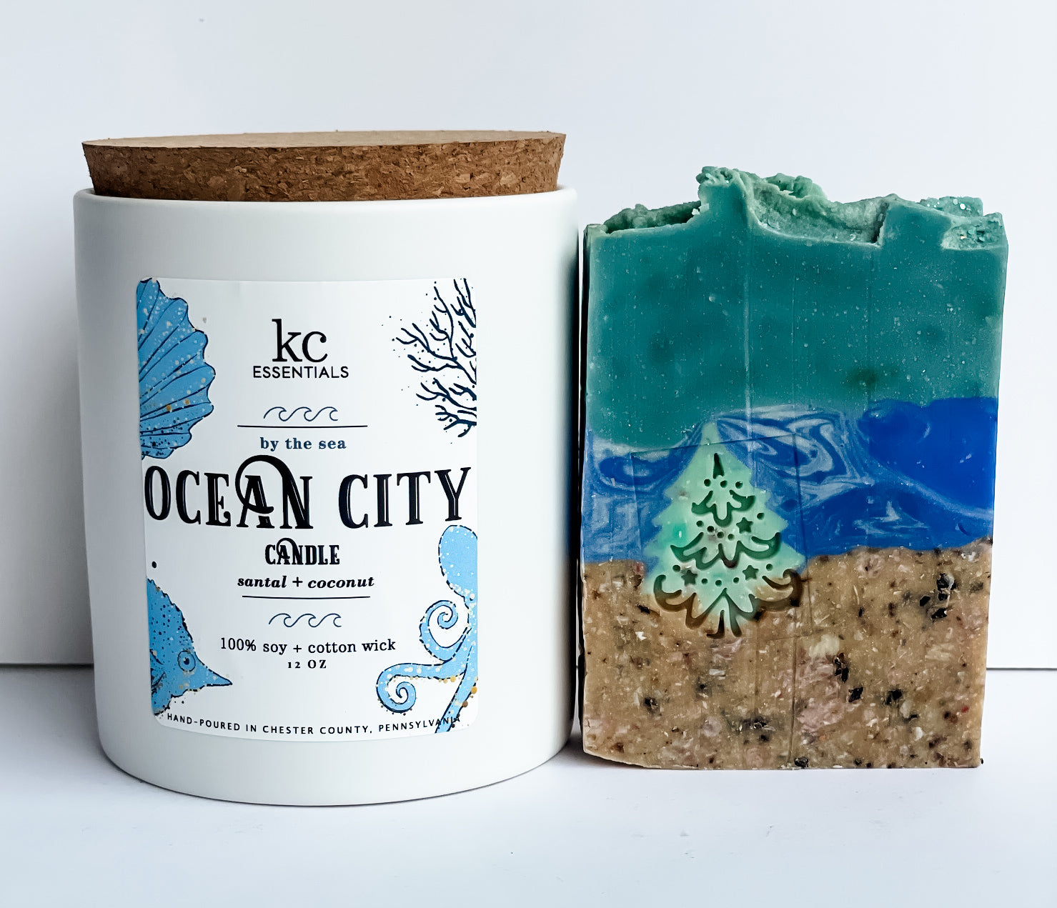 Ocean City christmas beach gift set includes handcrafted christmas on the beach soap bar, 5.5 ounces, Ocean City candle, 12 ounces, scented with santal and coconut.