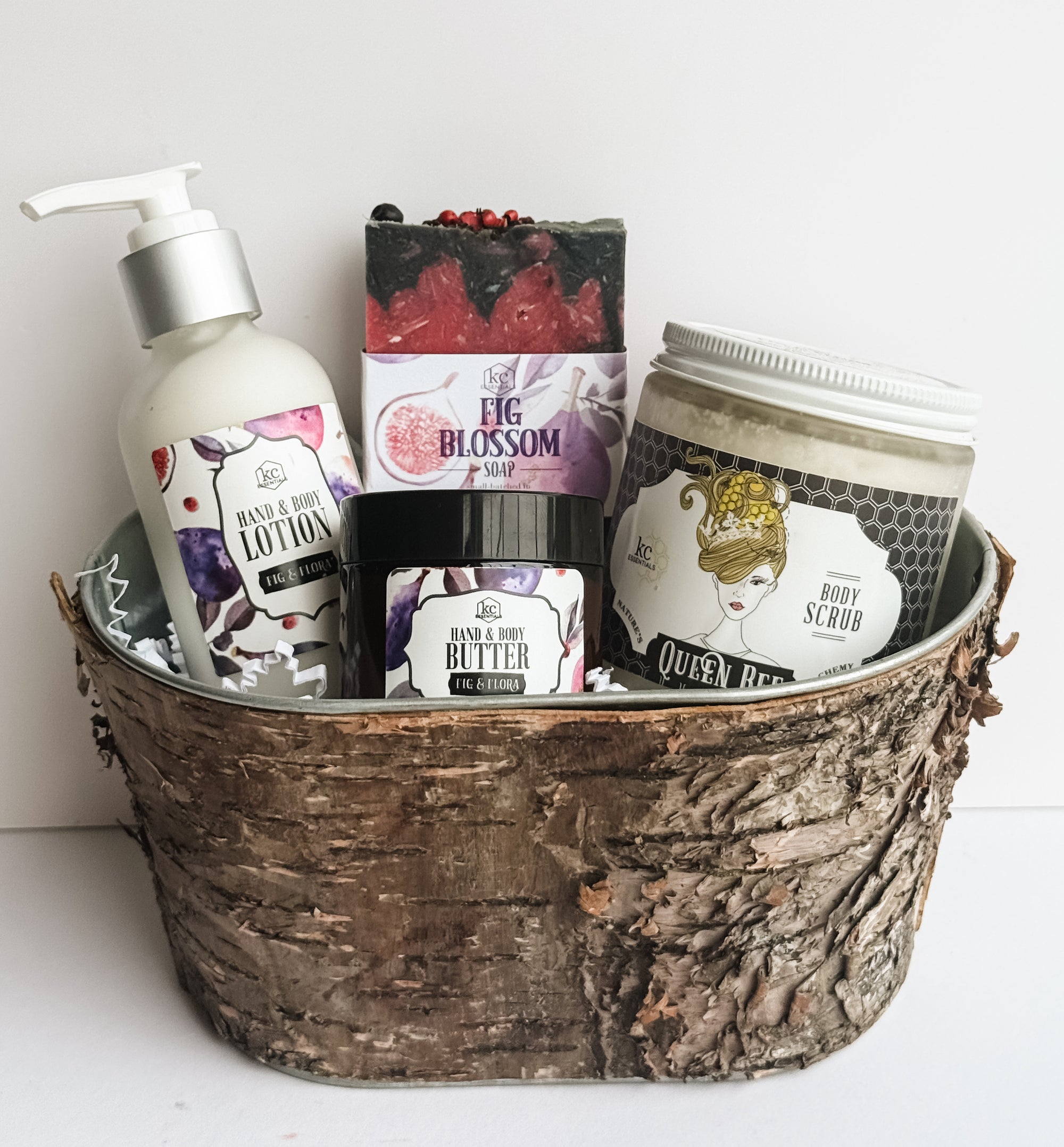 Fig Blossom gift set includes fig blossom handcrafted soap, hand and body lotion, hand and body butter, and body scrub. All fig scented. All natural gift set.