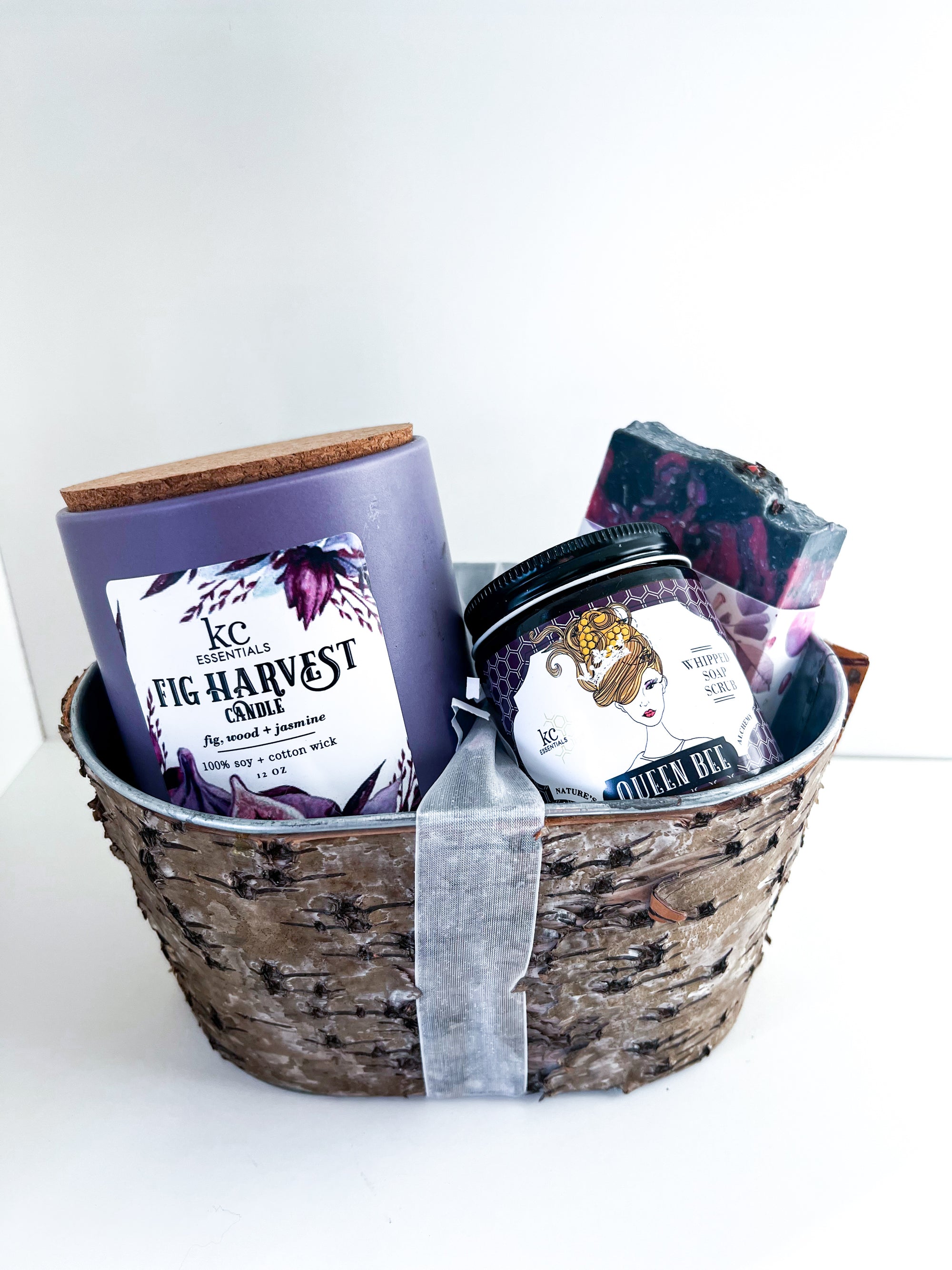 Fig harvest gift set includes fig harvest 12 ounce candle, whipped soap scrub, and fig harvest soap bar.