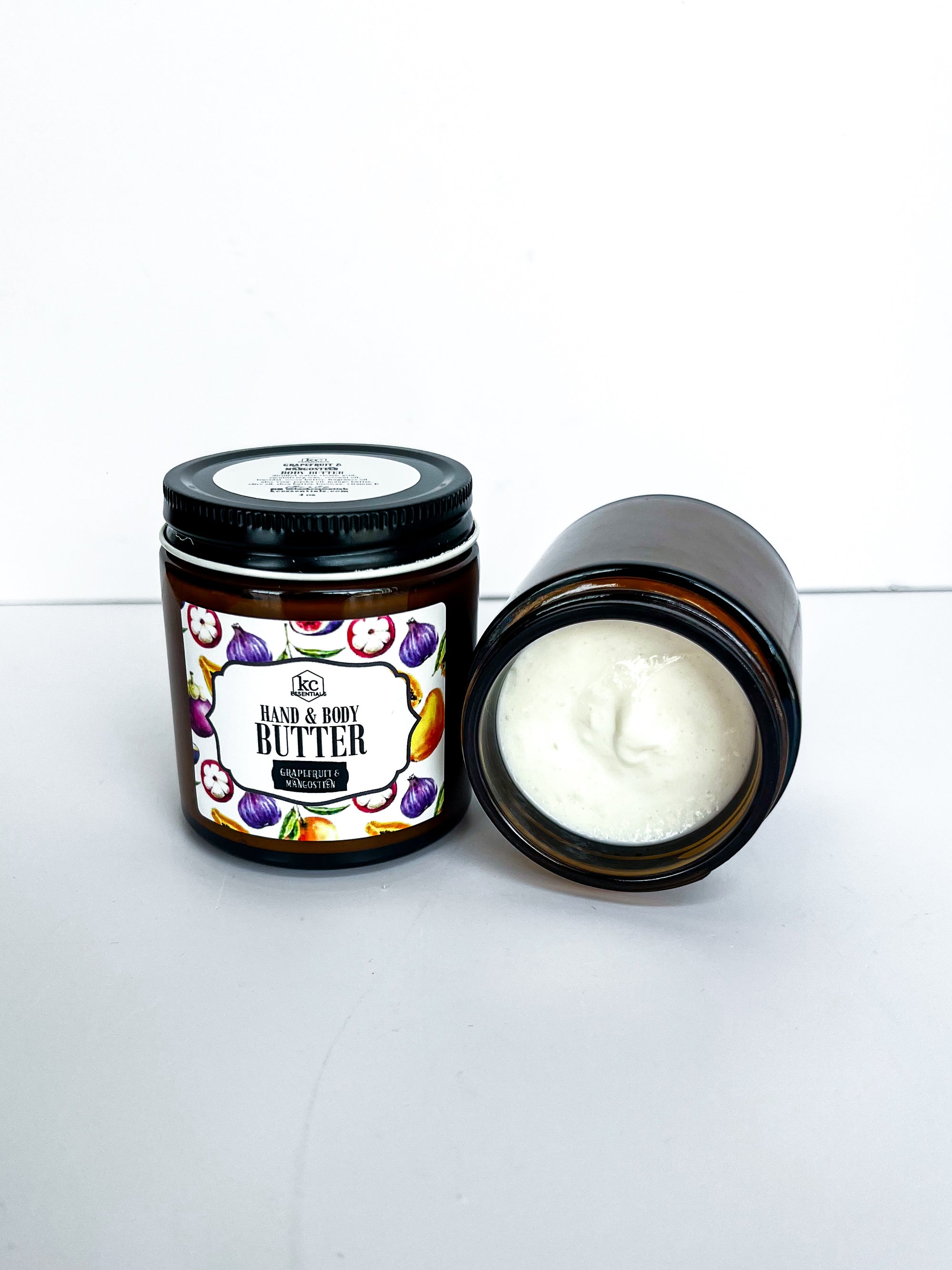 Body butter in 4 ounces, glass jars, hand and body butter, available in grapefruit and mangosteen scent.