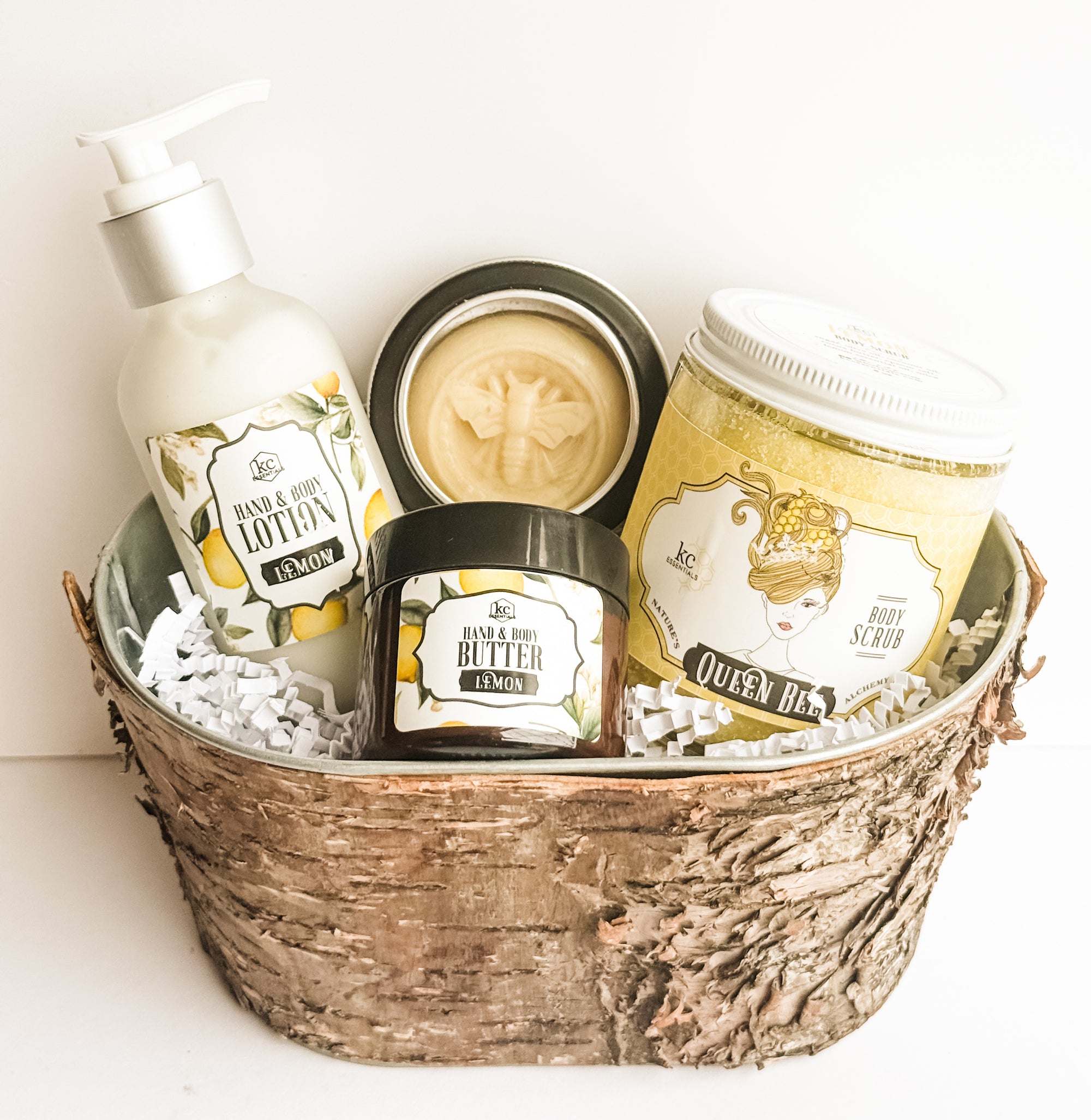 Lemon gift set includes lemon hand and body lotion, body butter, lotion bar, and body scrub. All lemon scented. All natural gift set.