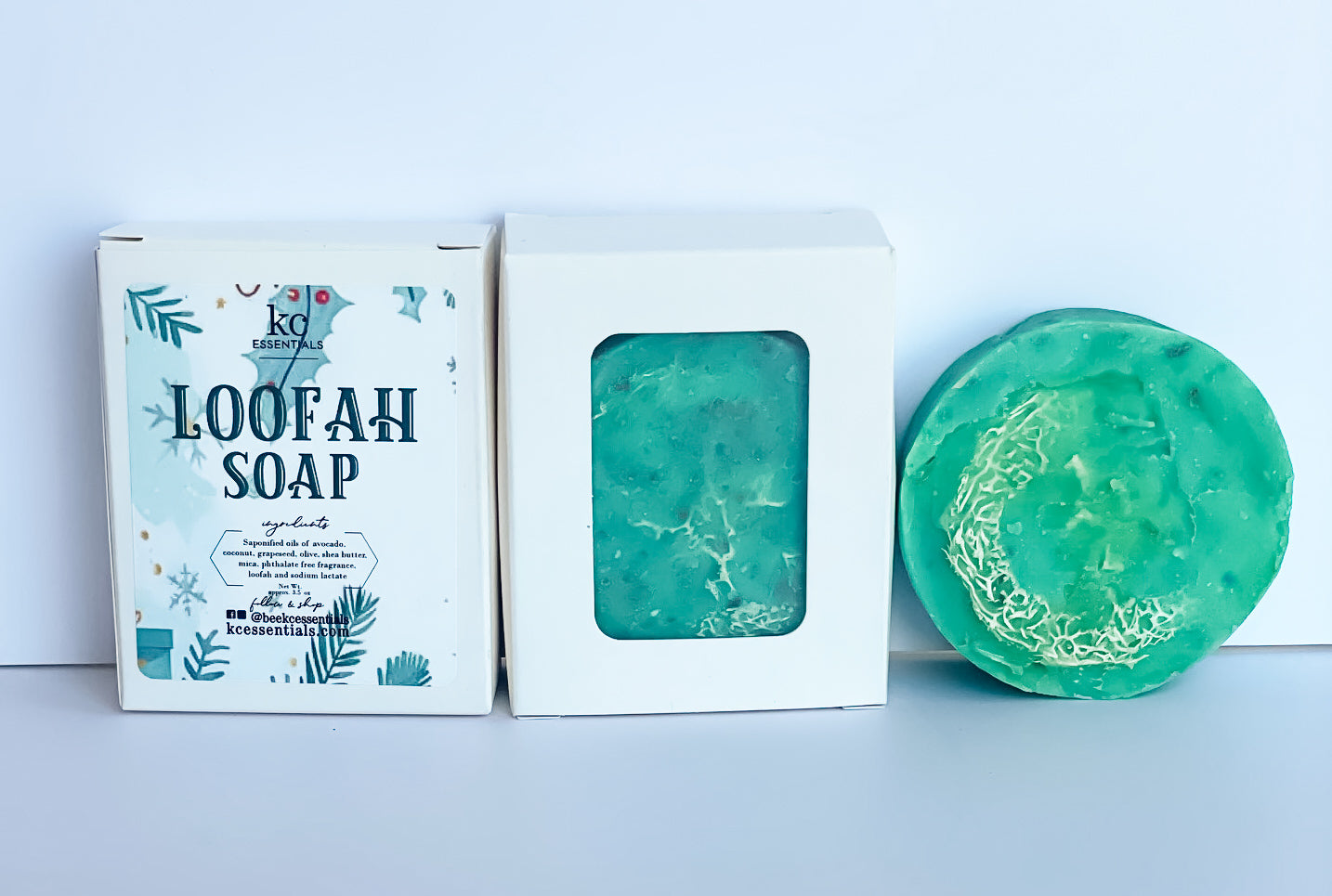 handcrafted loofah soap bar, packaged in a cardboard box, green color, unscented.