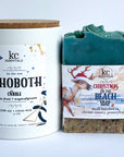 Rehoboth christmas beach gift set includes handcrafted christmas on the beach soap bar, 5.5 ounces, Rehoboth candle, 12 ounces, scented with exotic fruit and tropical greens.