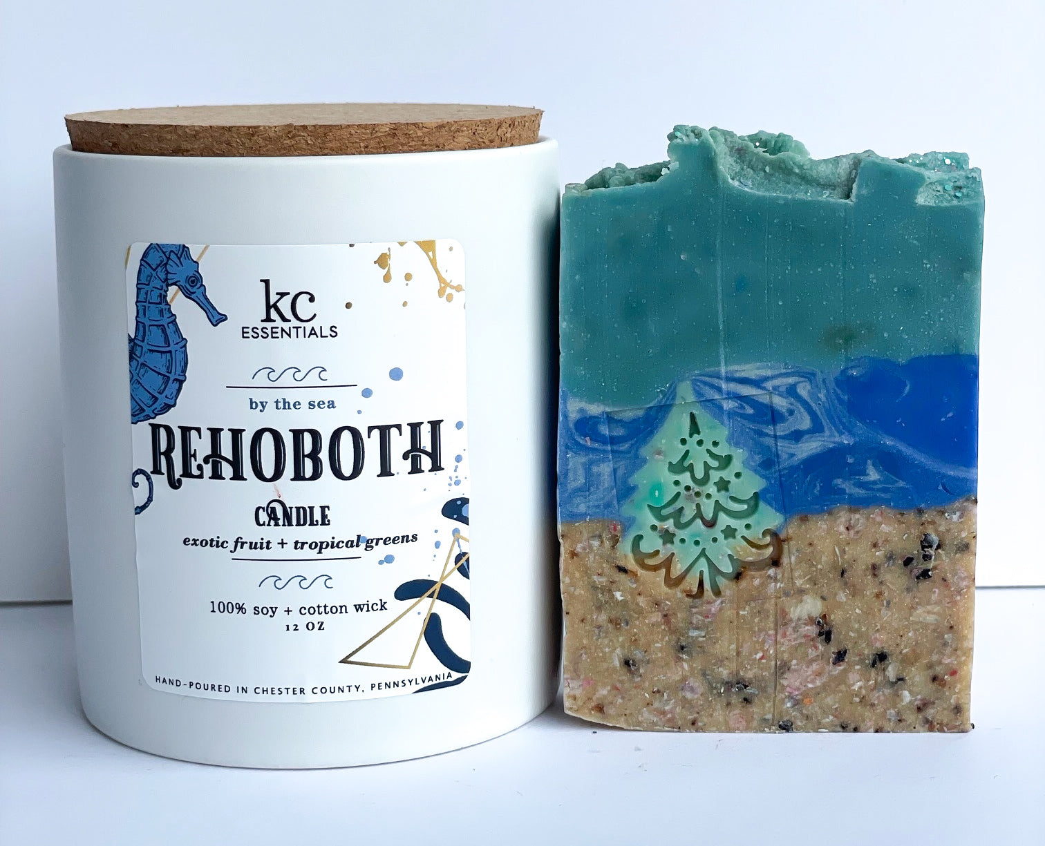 Rehoboth christmas beach gift set includes handcrafted christmas on the beach soap bar, 5.5 ounces, Rehoboth candle, 12 ounces, scented with exotic fruit and tropical greens.