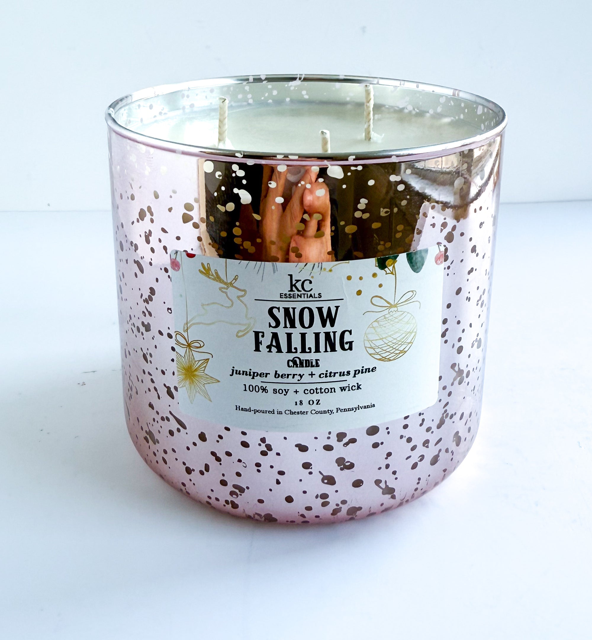 Speckled glass candle with a label on a white background, Snow falling candle, holiday candle, winter theme, christmas scented candle, 100% soy candle, all natural ingredients