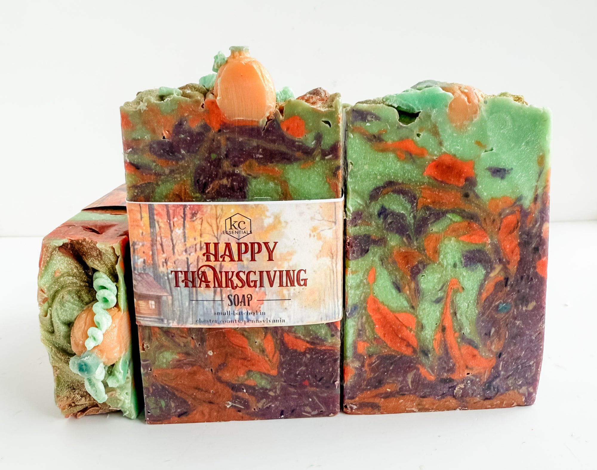 Colorful soap bar with 'Happy Thanksgiving' label on a white background, fall soap, thanksgiving, holiday, fall scented, fall spice
