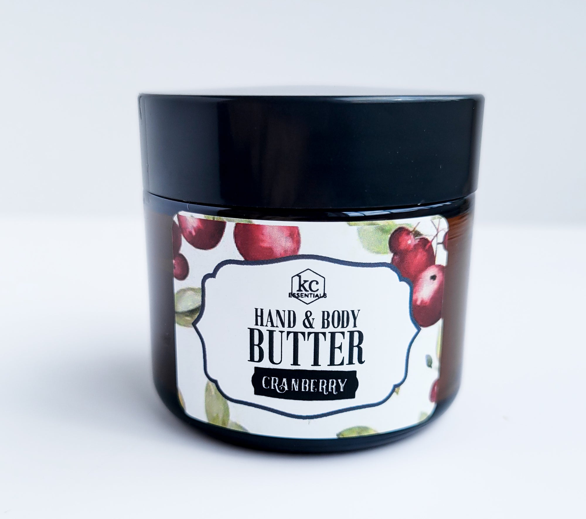 hand and body butter, made with jojoba oil, beeswax, mango butter, and coconut butter, 2 ounces, cranberry scented.