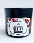 hand and body butter, made with jojoba oil, beeswax, mango butter, and coconut butter, 2 ounces, cranberry scented.