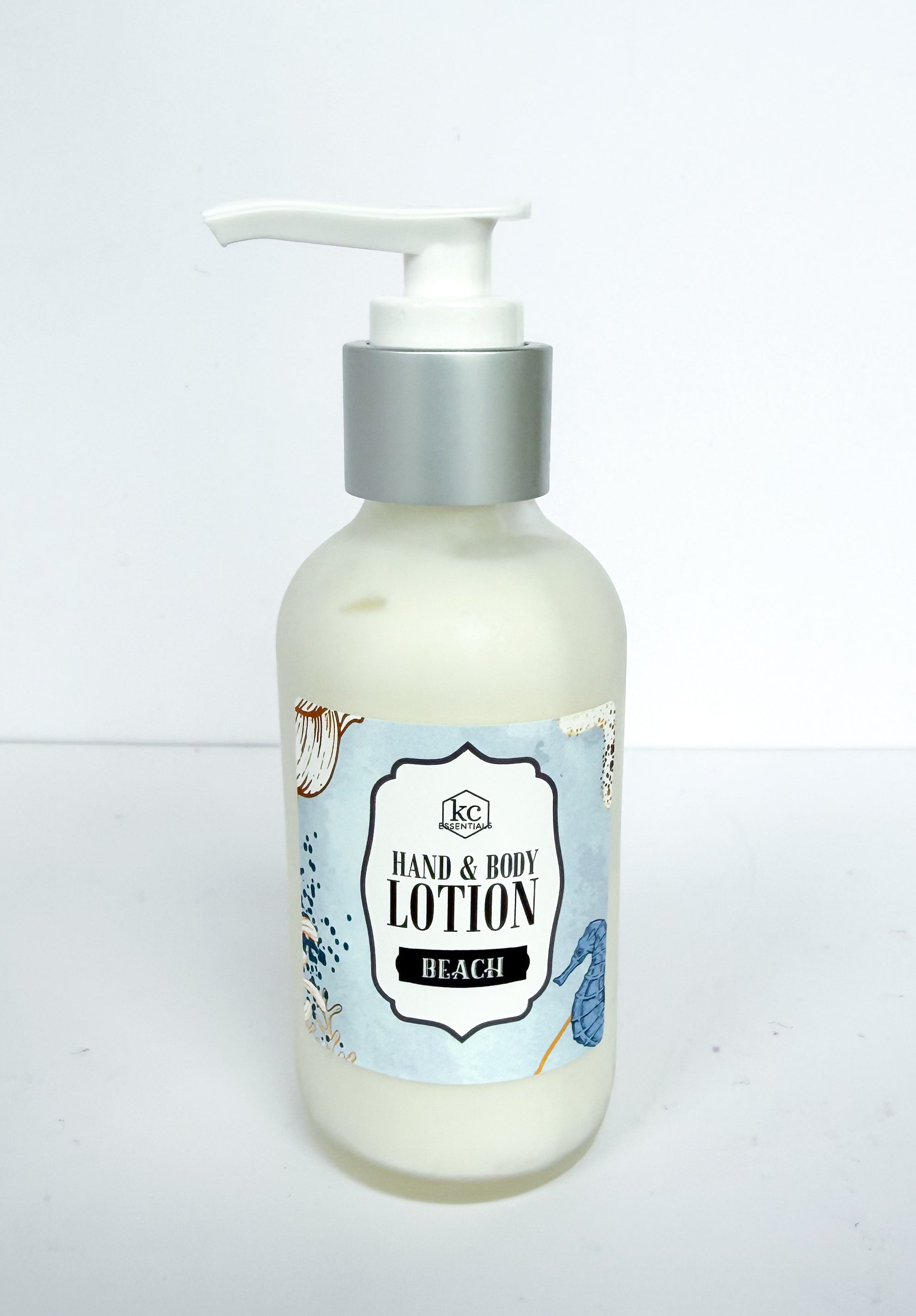 hand and body lotion scented in beach, 4 ounce glass bottles with pump dispenser