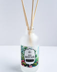 Reed diffuser, cranberry woods scented, 4 ounces.